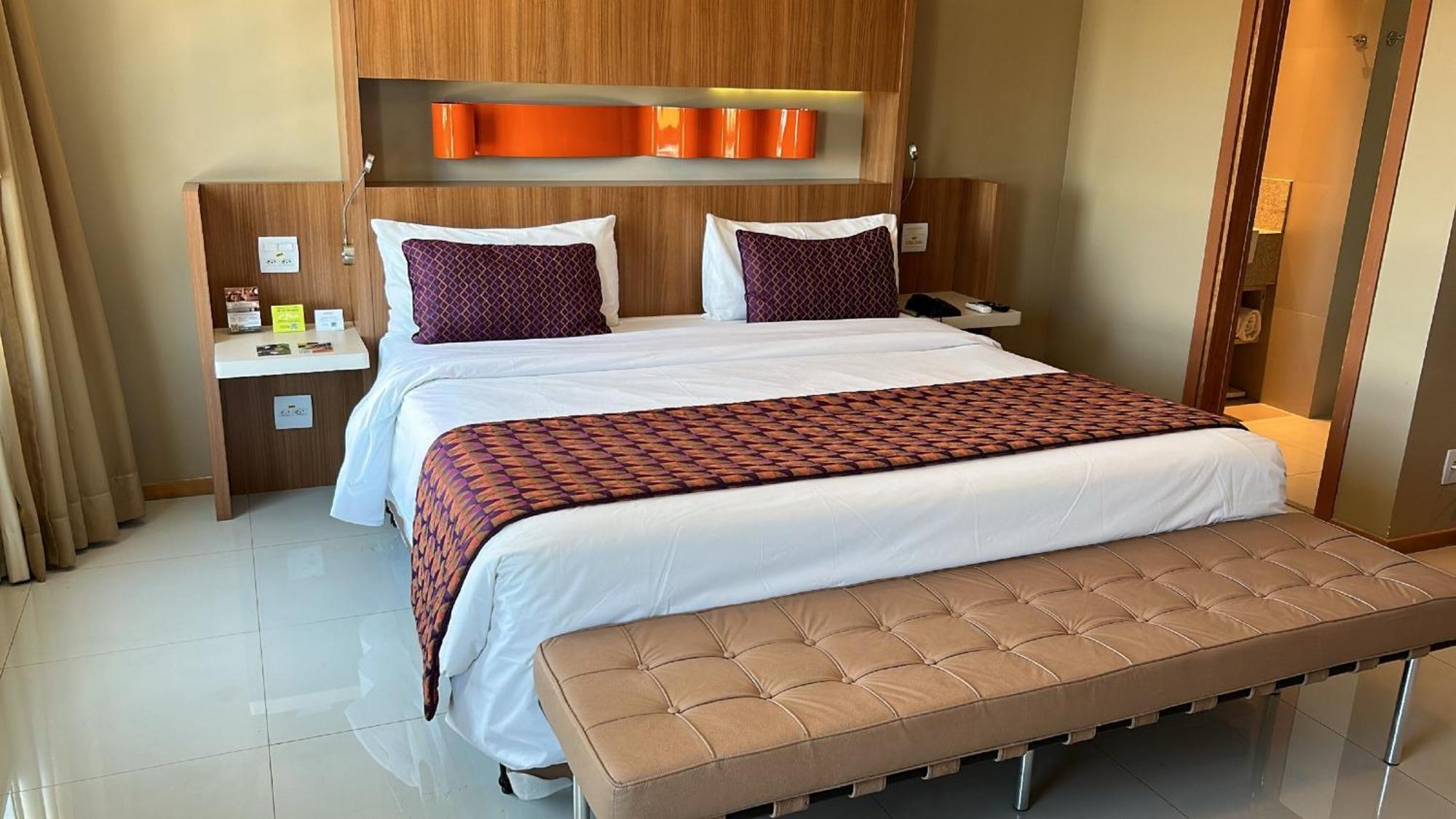 Jade Hotel Brasilia Candangolandia ภายนอก รูปภาพ A bed in a hotel room